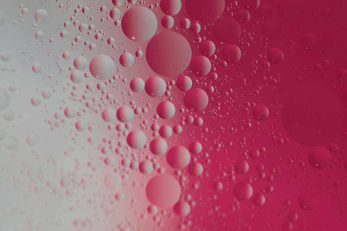 macro photo red molecules illustration bubble